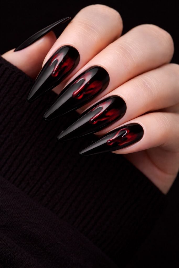 black with blood drip nail design