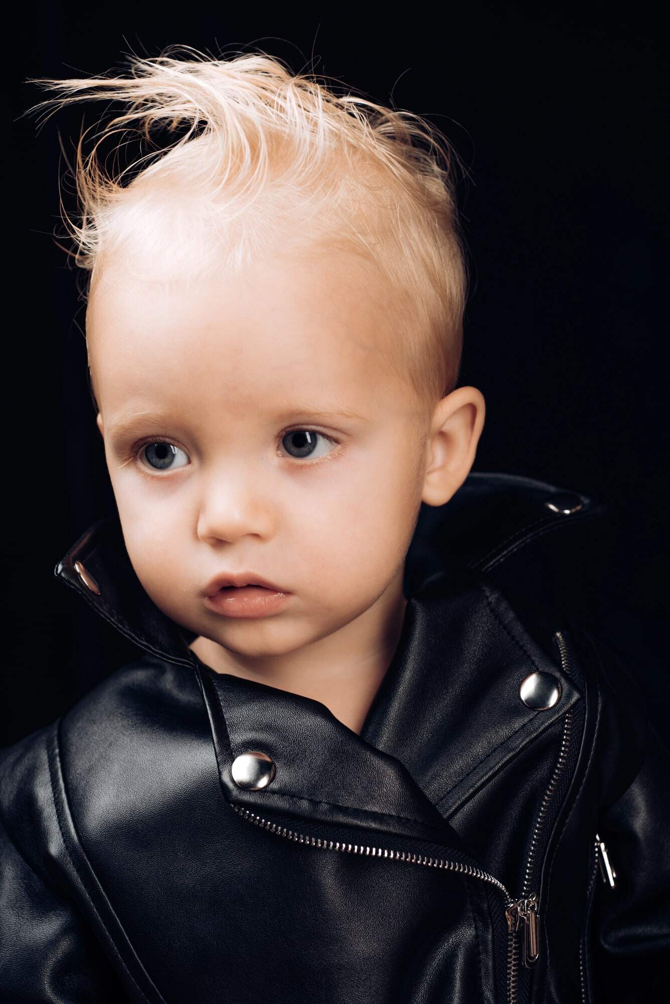 rebel punk toddler in leather jacket 